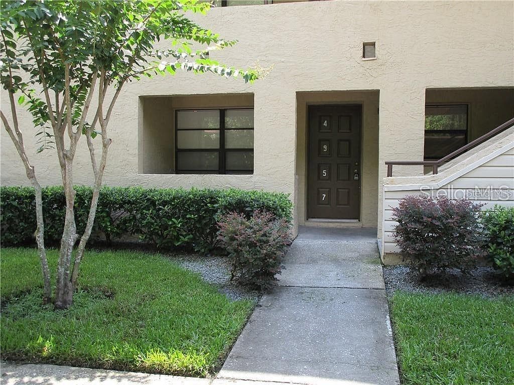 4957 PURITAN CIRCLE UNIT 403 TAMPA, FL 33617