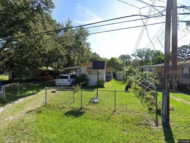 12909 FOUR OAKS ROAD TAMPA, FL 33624