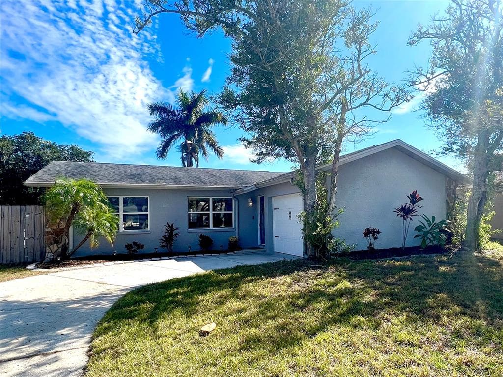 1445 WINDMOOR DRIVE DUNEDIN, FL 34698