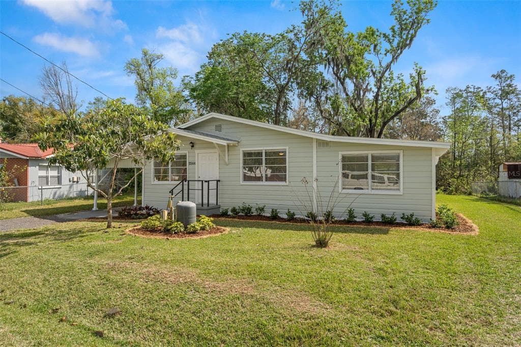 11144 LAKE SHORE DRIVE LAND O LAKES, FL 34637