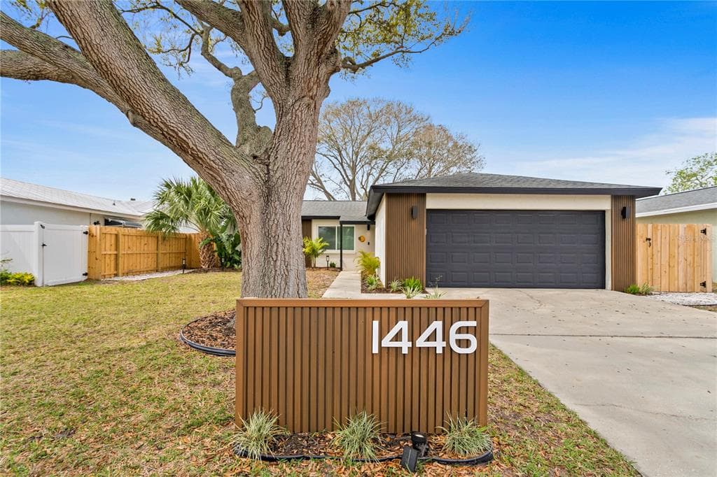 1446 WINDMOOR DRIVE DUNEDIN, FL 34698