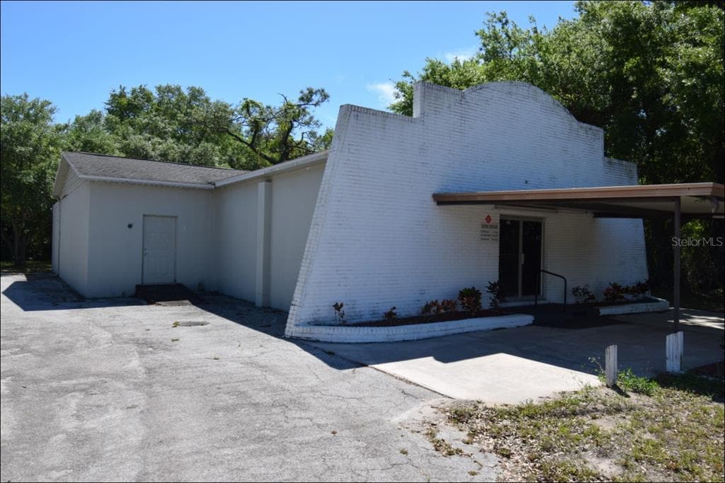 8015 PALM RIVER ROAD TAMPA, FL 33619