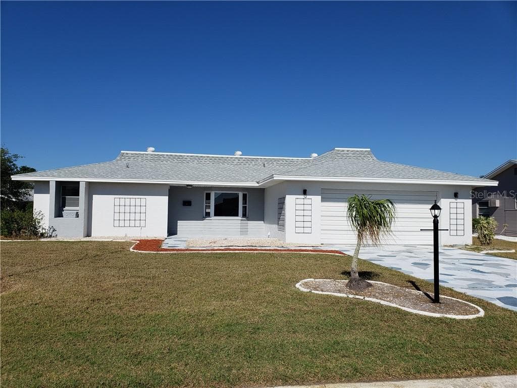 1212 FORDHAM DRIVE SUN CITY CENTER, FL 33573