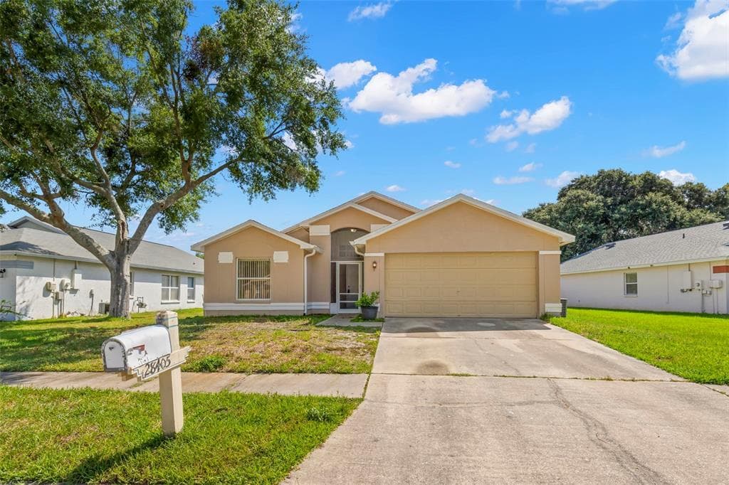 28405 TALL GRASS DRIVE WESLEY CHAPEL, FL 33543