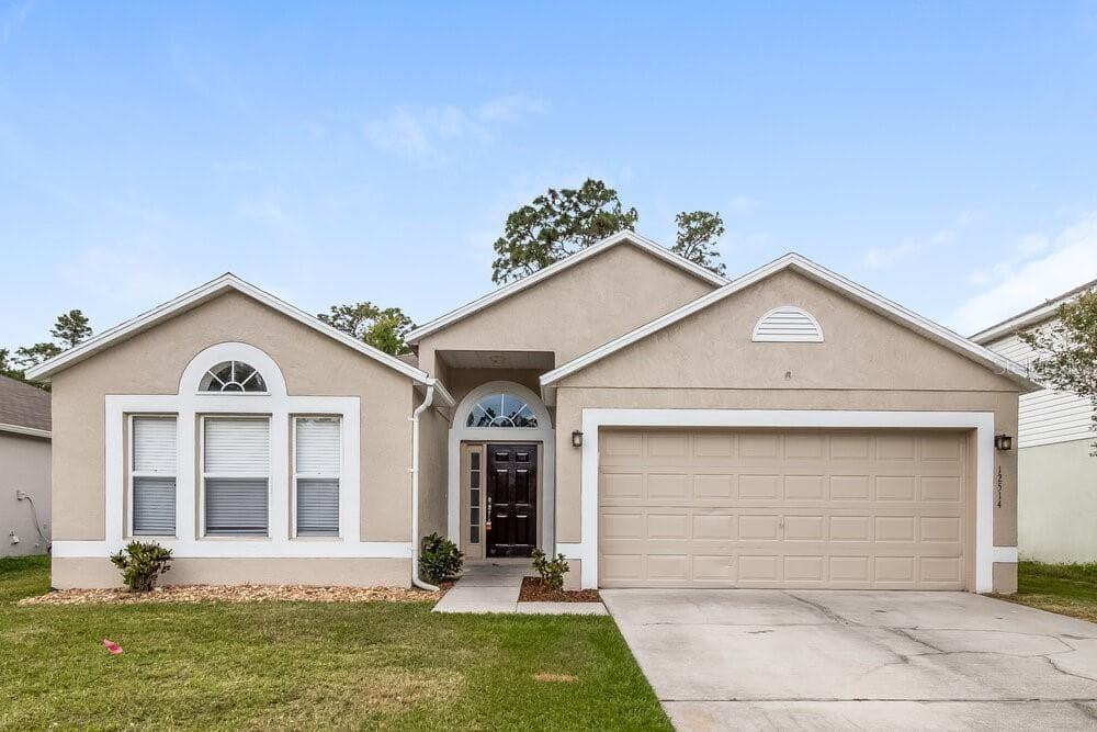 12514 WOODBURY COVE DRIVE ORLANDO, FL 32828