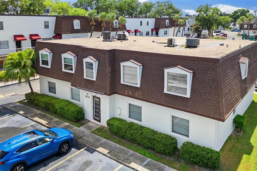 9218 TUDOR DRIVE UNIT P202 TAMPA, FL 33615