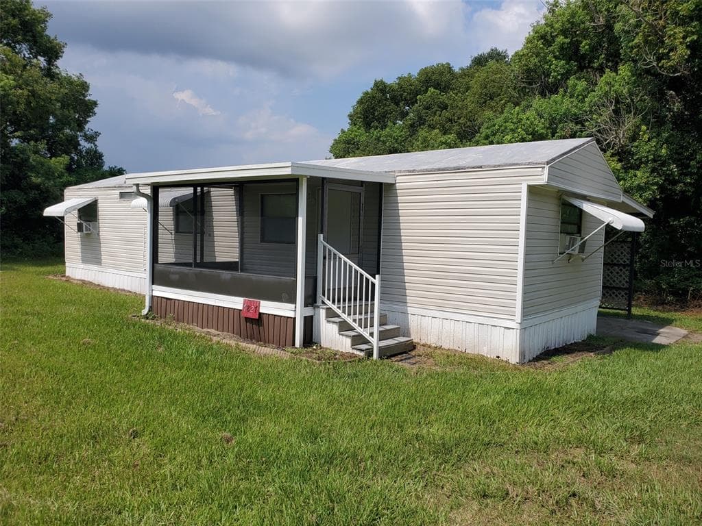 7827 WAYFARER DRIVE ZEPHYRHILLS, FL 33541