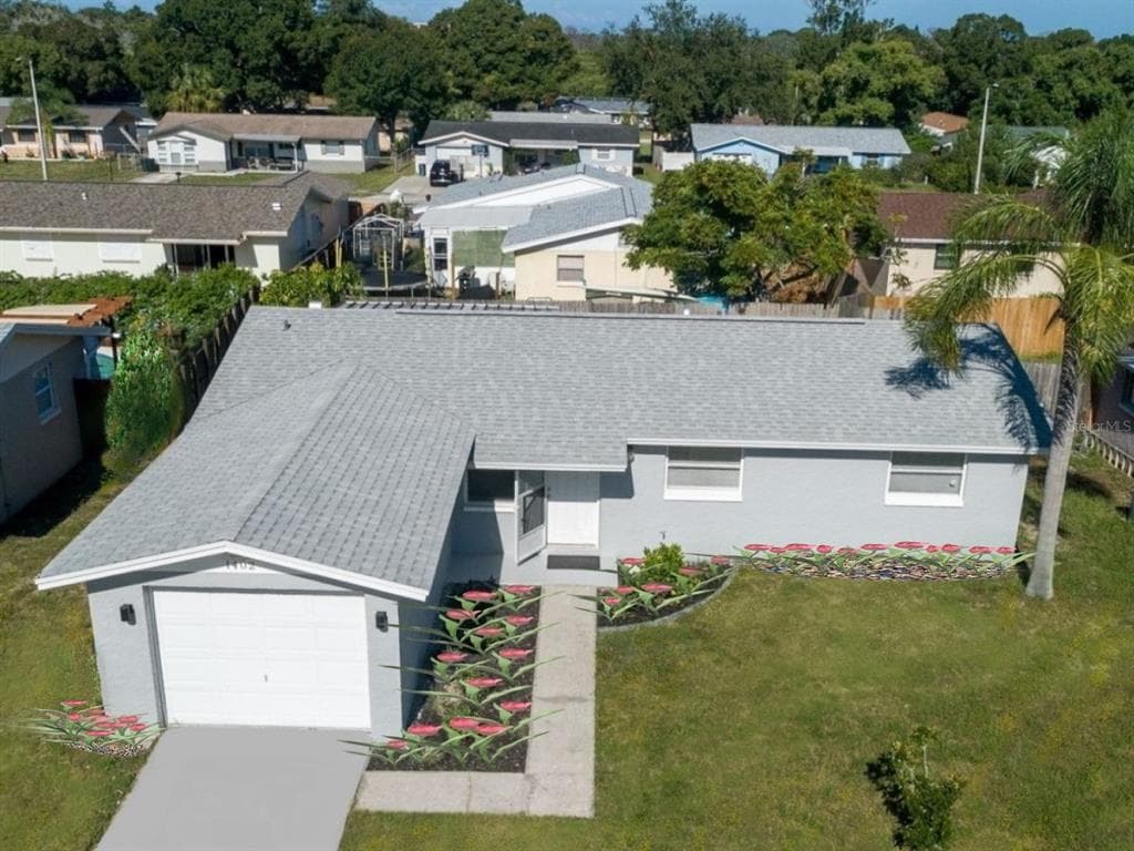 1402 FOX RUN DRIVE TARPON SPRINGS, FL 34689