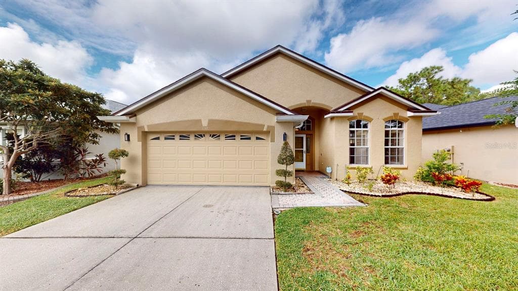 4748 WHISPERING WIND AVENUE TAMPA, FL 33614