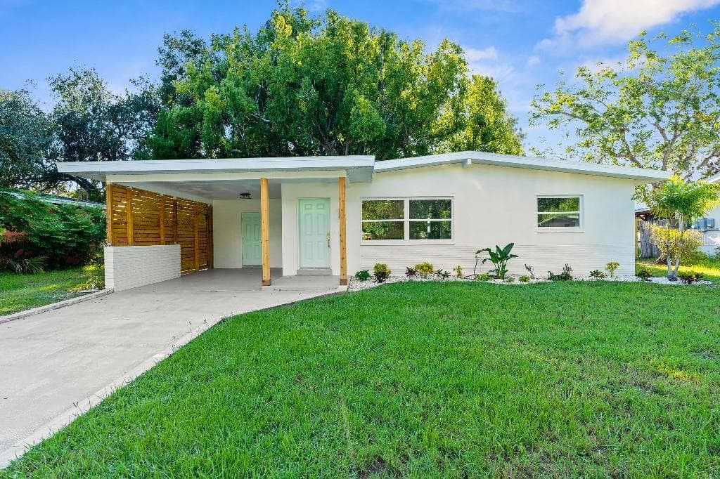 1242 ROBIN HOOD LANE DUNEDIN, FL 34698