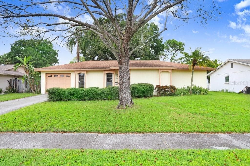 8409 WOODHURST DRIVE TAMPA, FL 33615