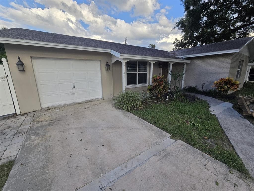 6421 ROSEWOOD DRIVE TAMPA, FL 33615