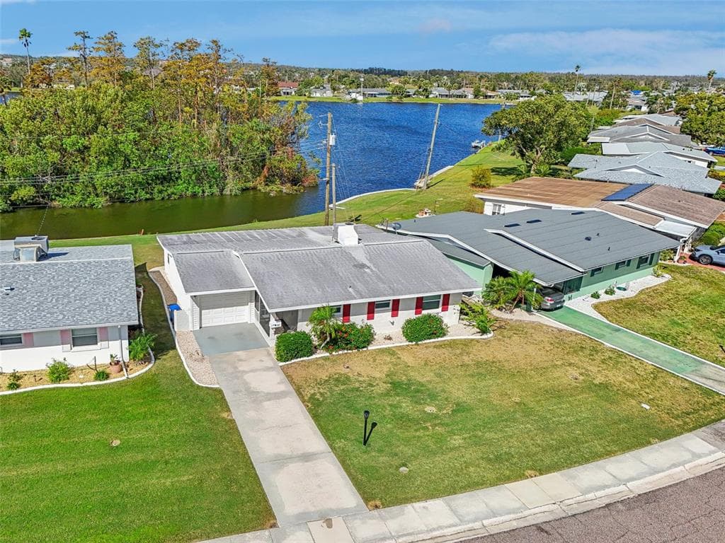 906 AUGUSTA DRIVE SUN CITY CENTER, FL 33573