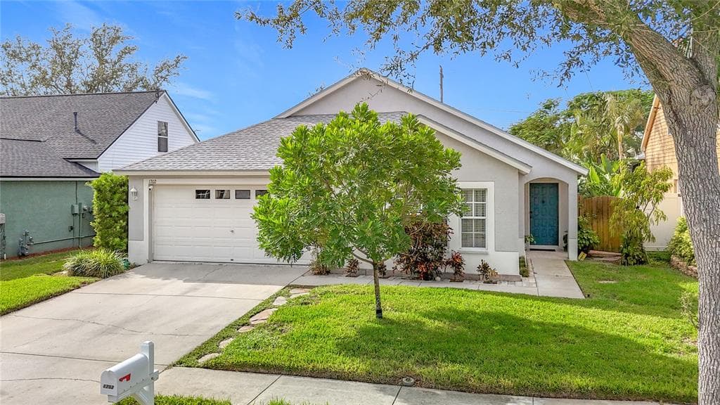 1702 MEADOW OAK LANE TARPON SPRINGS, FL 34689