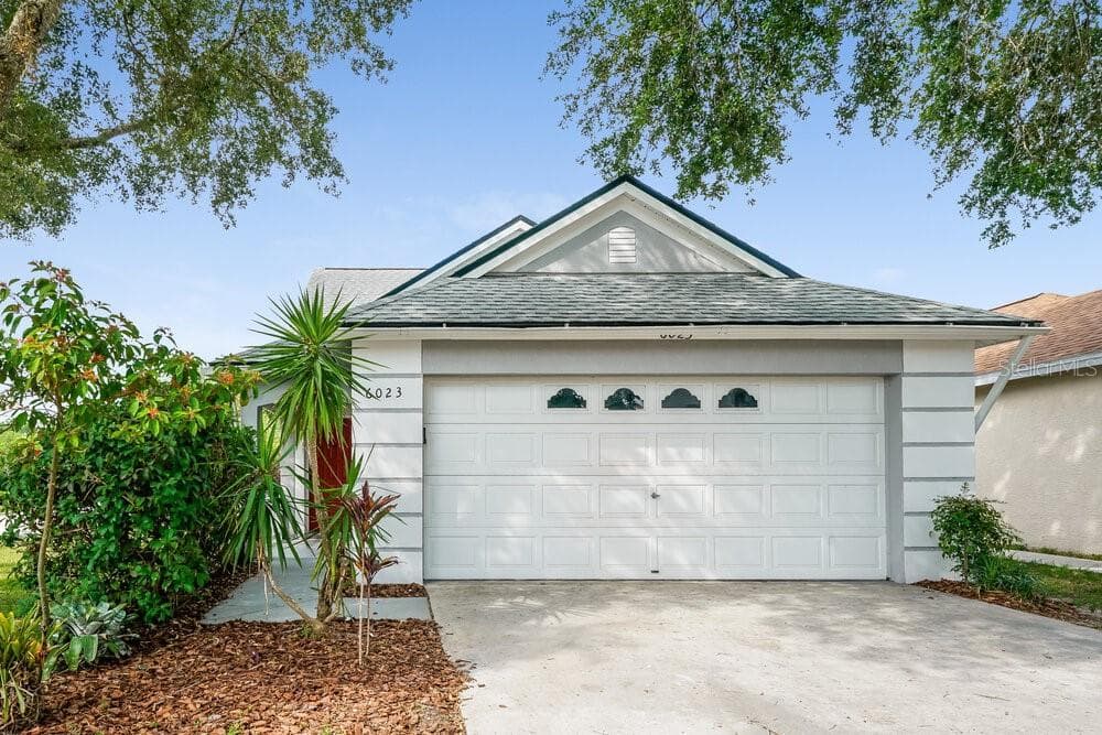 6023 SAND KEY LANE WESLEY CHAPEL, FL 33545