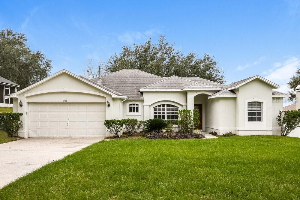 1128 WINDY BLUFF DRIVE MINNEOLA, FL 34715