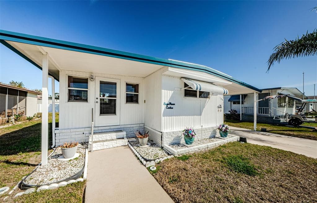 159 MELODY LANE TARPON SPRINGS, FL 34689