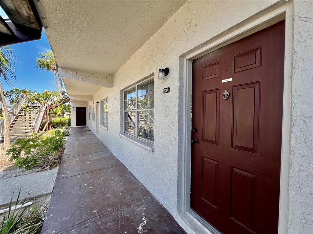 9221 TUDOR DRIVE UNIT A104 TAMPA, FL 33615