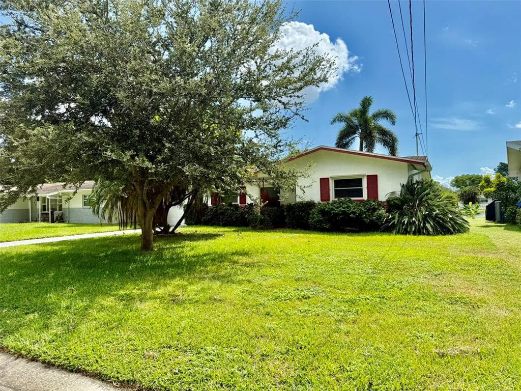 1229 LAZY LAKE ROAD W DUNEDIN, FL 34698