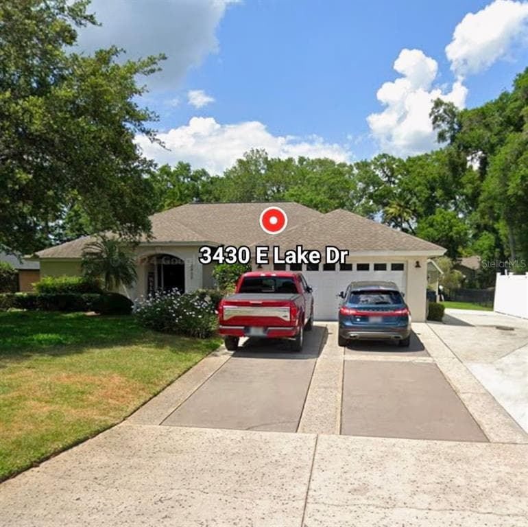 3430 E LAKE DRIVE LAND O LAKES, FL 34639