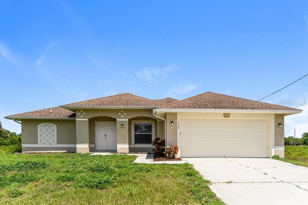 719 ROMA AVENUE S LEHIGH ACRES, FL 33974