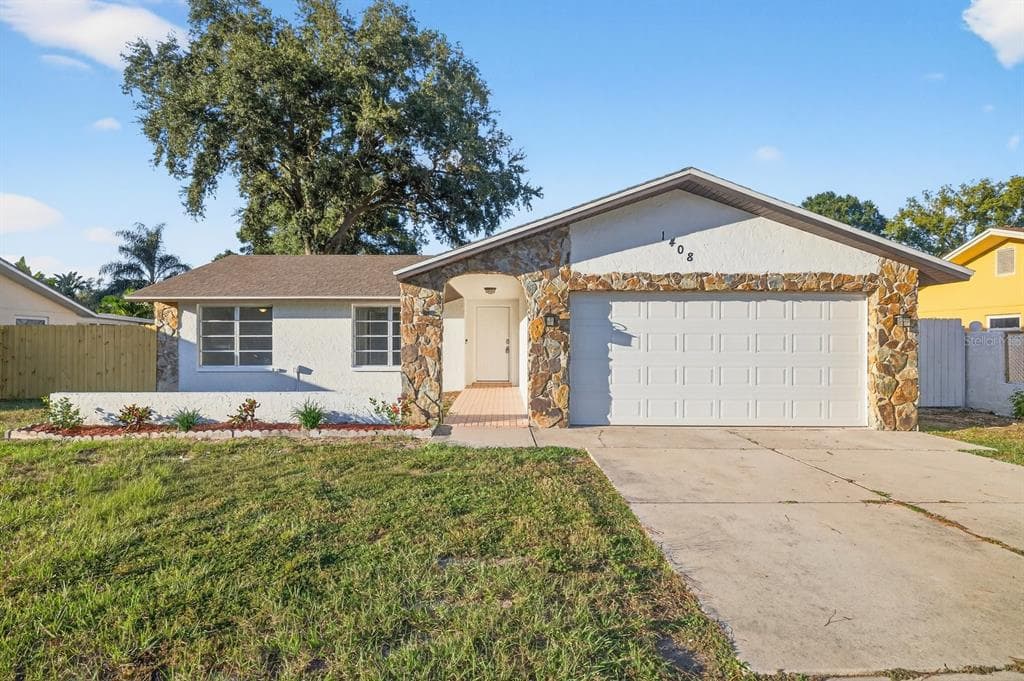 1408 OLEANDER DRIVE TARPON SPRINGS, FL 34689
