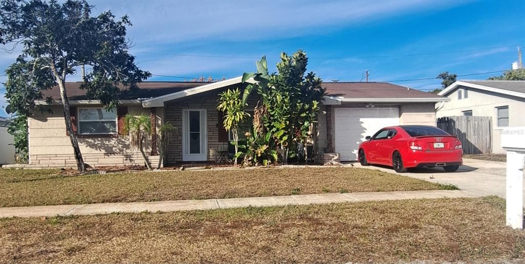 1153 TAMARAC DRIVE HOLIDAY, FL 34690