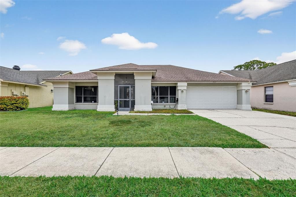 9410 PEBBLE GLEN AVENUE TAMPA, FL 33647